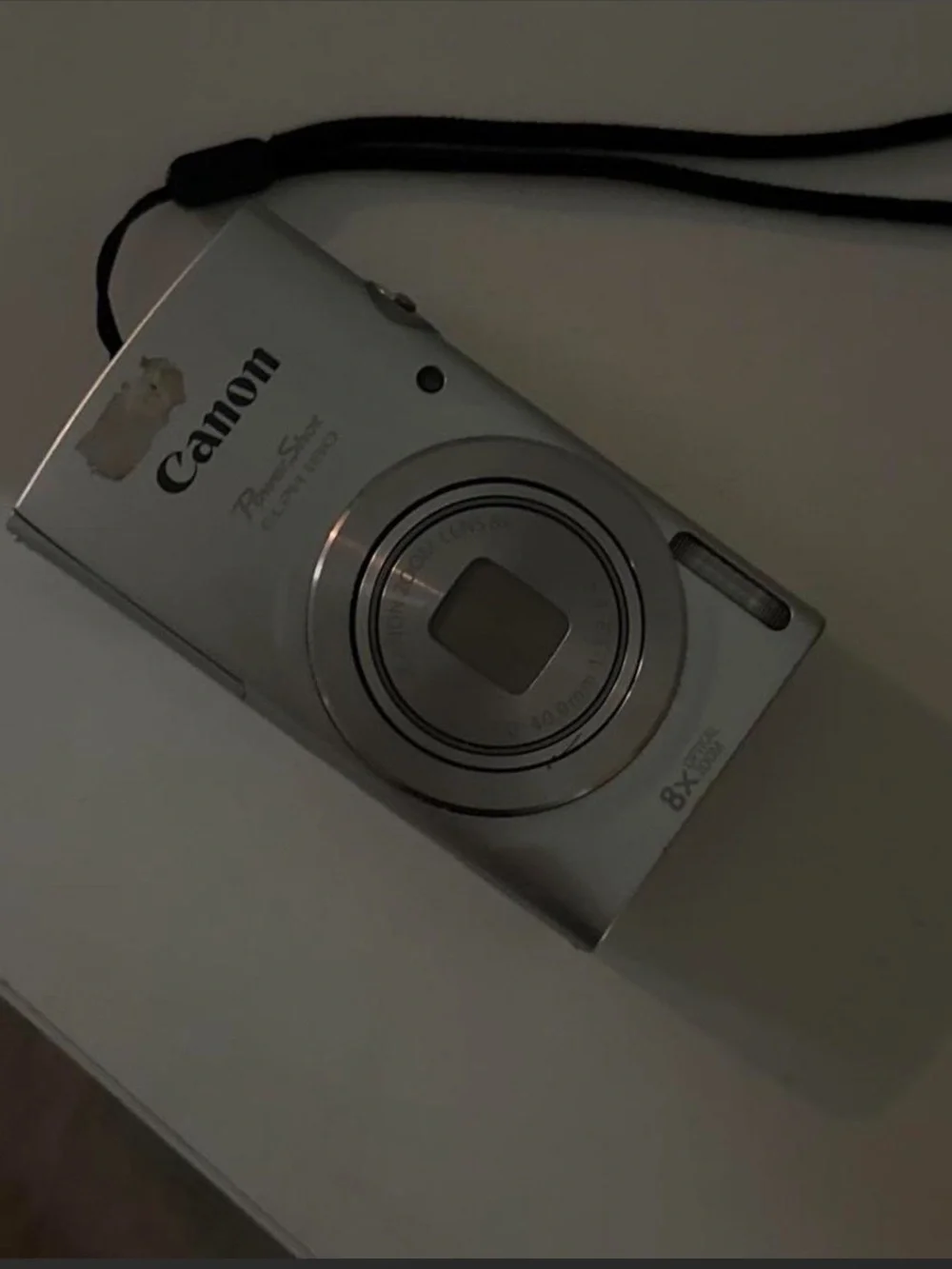 Canon Silver Compact Point-and-Shoot Camera with Wrist Strap